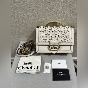 Coach Riley top handle bag with flower appliqués